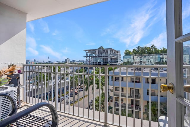 balcony featuring a view of city and central AC