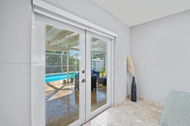 entryway featuring french doors