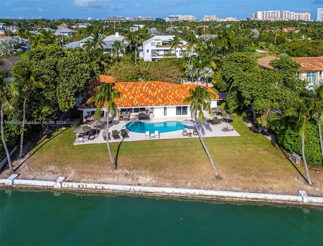 birds eye view of property featuring a water view