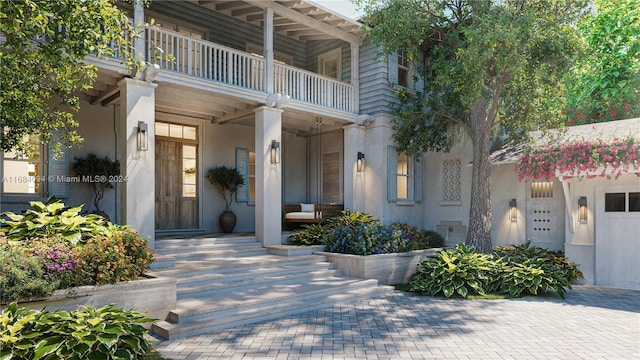 520 S Mashta Dr, Key Biscayne, FL 33149 - view of front of property with stucco siding, covered porch, and a balcony