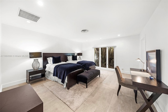 bedroom featuring light hardwood / wood-style flooring