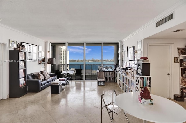 tiled living room featuring ornamental molding, a water view, and floor to ceiling windows