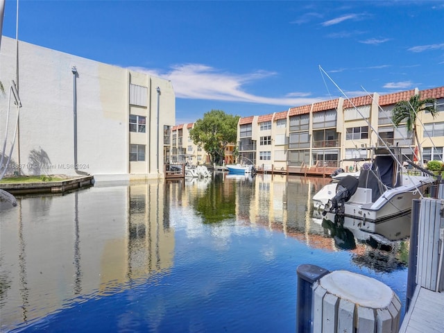 property view of water featuring a boat dock