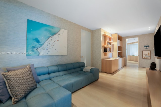 living room with light hardwood / wood-style floors