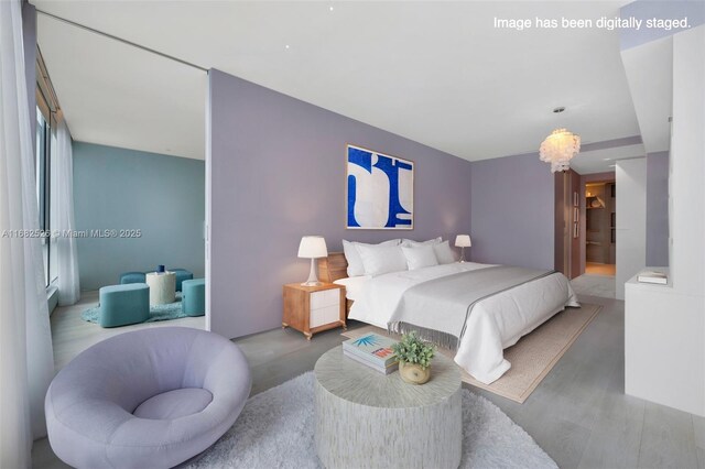 bedroom featuring hardwood / wood-style flooring