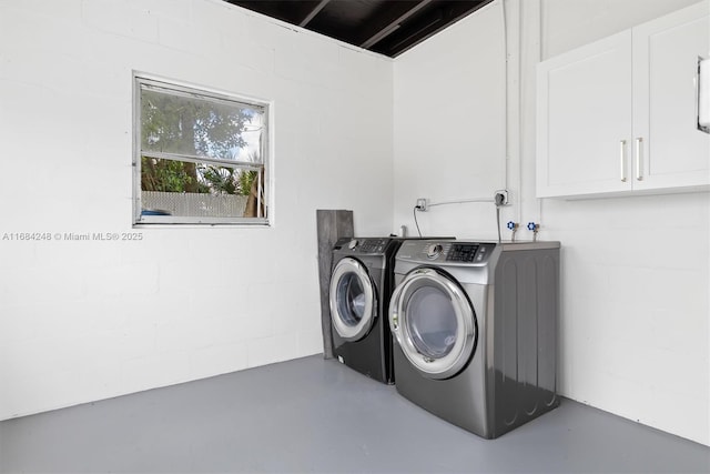 laundry area featuring separate washer and dryer