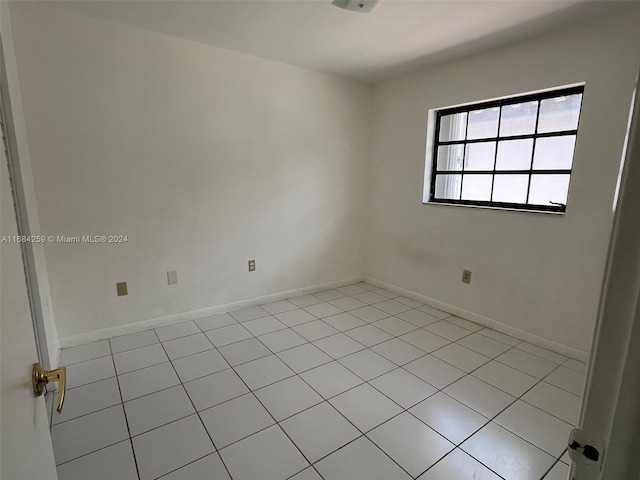 view of tiled spare room