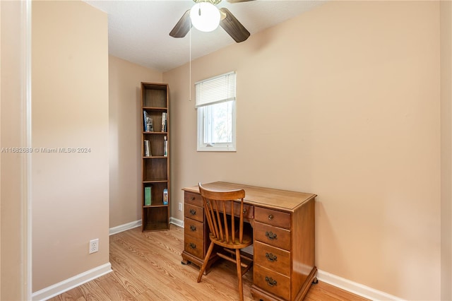 office space with light hardwood / wood-style floors, a textured ceiling, and ceiling fan