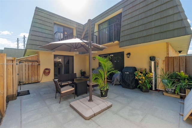 rear view of property with a patio area