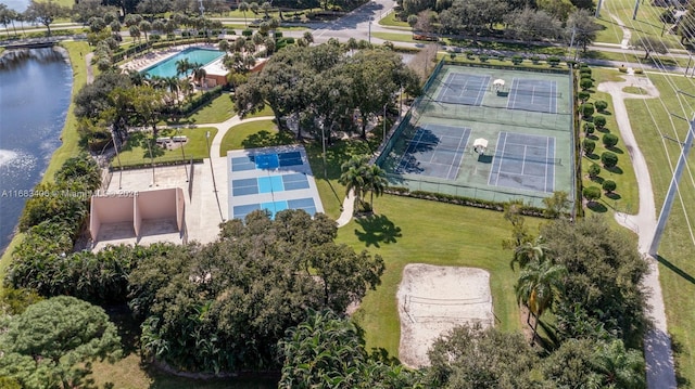 birds eye view of property with a water view