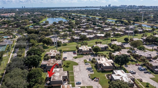 birds eye view of property featuring a water view