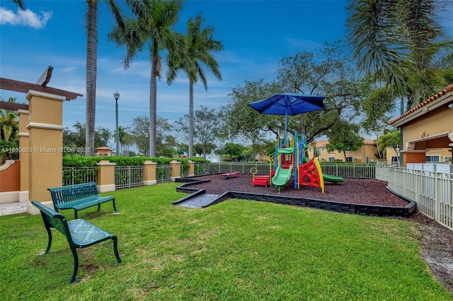 view of playground featuring a yard