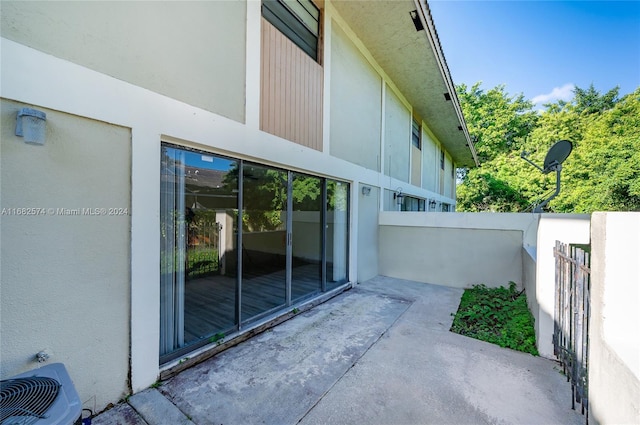 view of home's exterior featuring a patio area and central AC unit