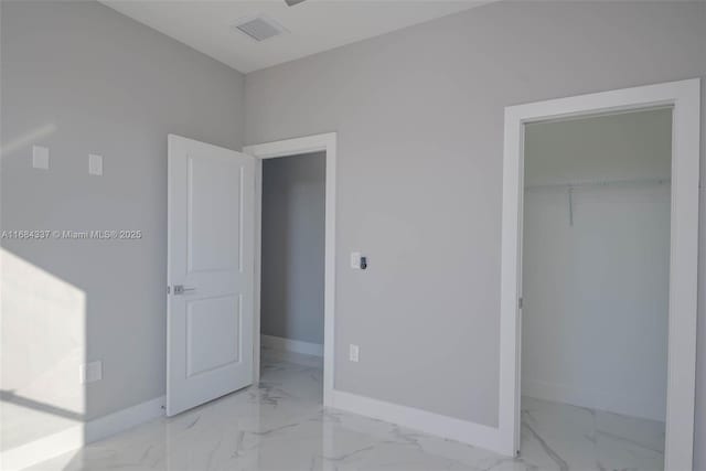 unfurnished bedroom featuring a closet