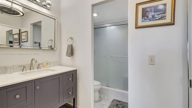 bathroom with toilet, a stall shower, tile patterned floors, and vanity