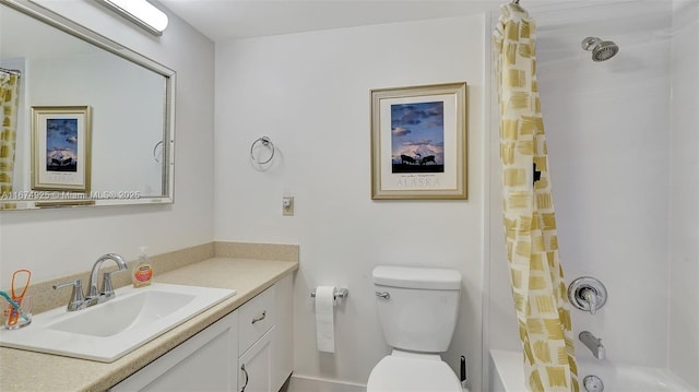 full bath with toilet, shower / bath combo with shower curtain, and vanity