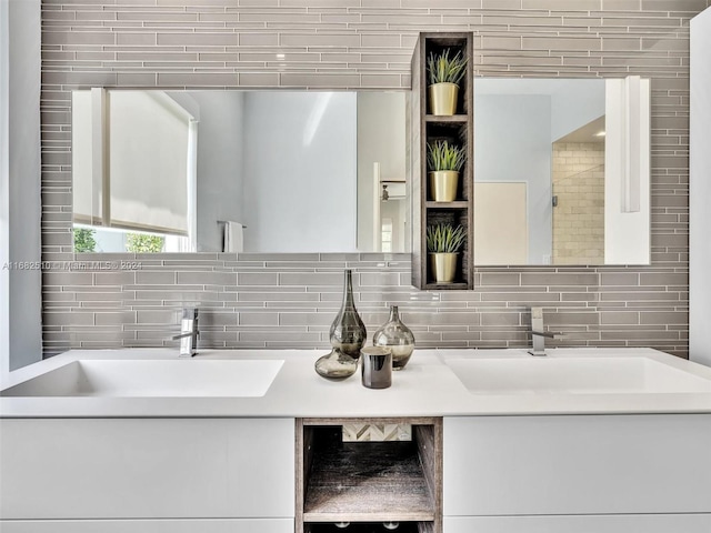 bathroom featuring vanity, decorative backsplash, and walk in shower