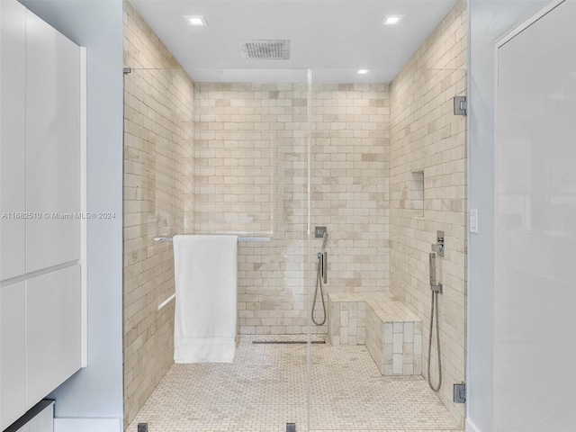 bathroom with an enclosed shower