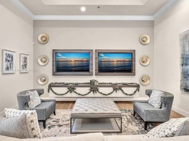 living room featuring ornamental molding and hardwood / wood-style floors