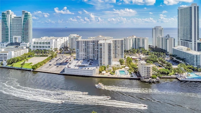 birds eye view of property featuring a water view