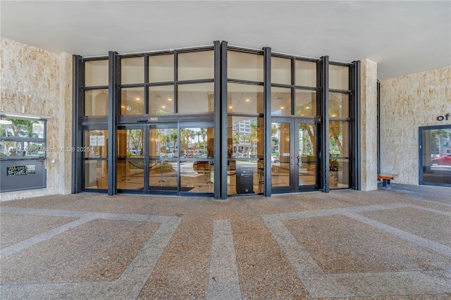 property entrance featuring french doors