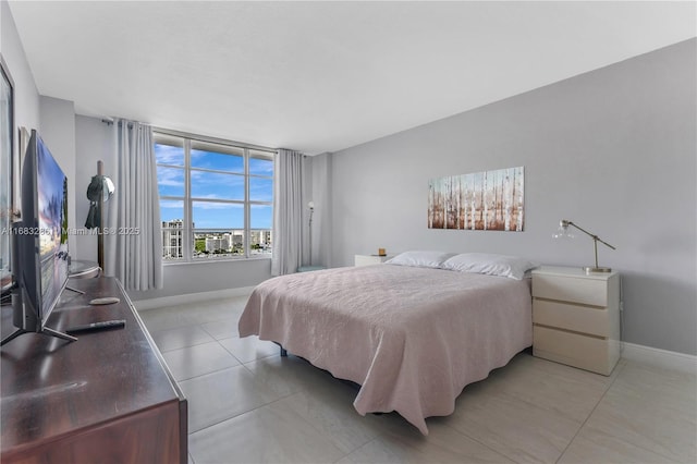 bedroom featuring multiple windows