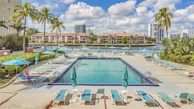 view of swimming pool featuring a patio