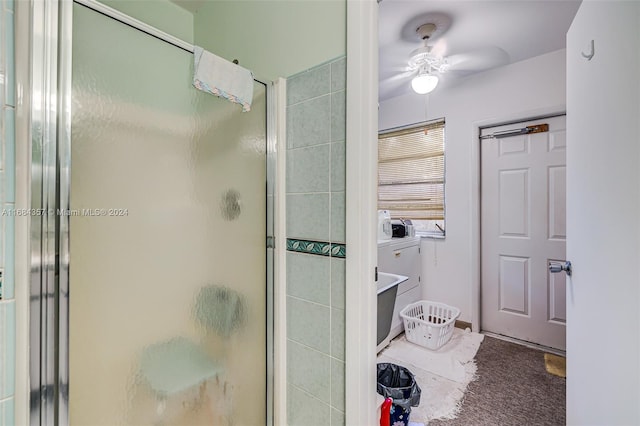 bathroom with walk in shower and ceiling fan