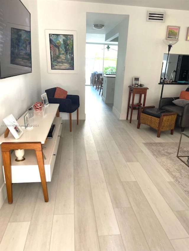 hallway featuring light hardwood / wood-style floors