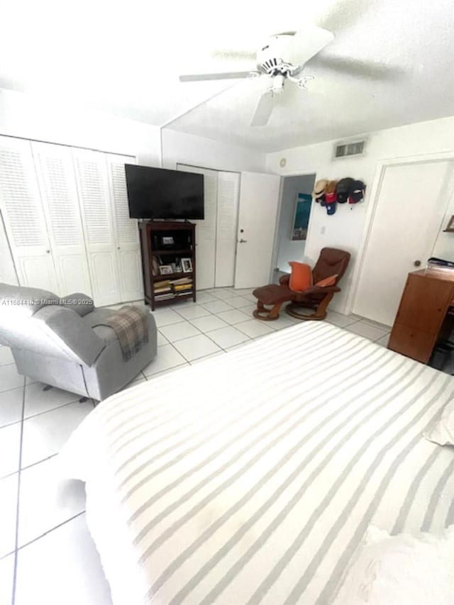 265 Grapetree Dr Unit 108, Key Biscayne, FL 33149 - bedroom with light tile patterned flooring and ceiling fan