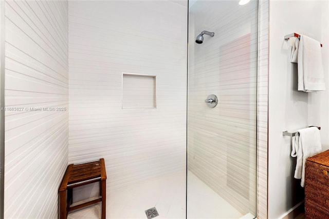 bathroom featuring tiled shower