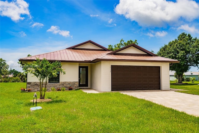 ranch-style house featuring a garage and a front lawn