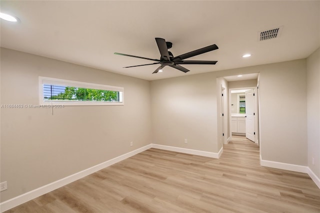 unfurnished room with light hardwood / wood-style floors and ceiling fan