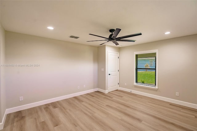 unfurnished room with light hardwood / wood-style floors and ceiling fan