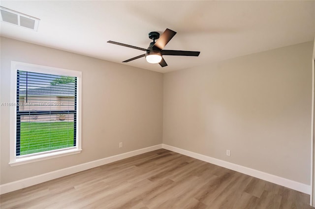 unfurnished room with light hardwood / wood-style floors and ceiling fan