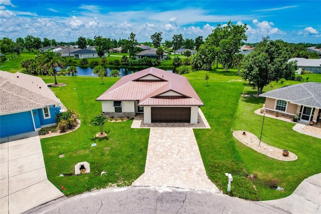 bird's eye view with a water view