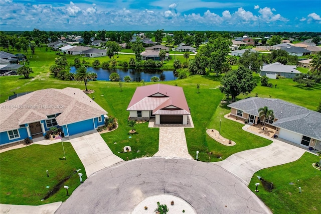 birds eye view of property featuring a water view