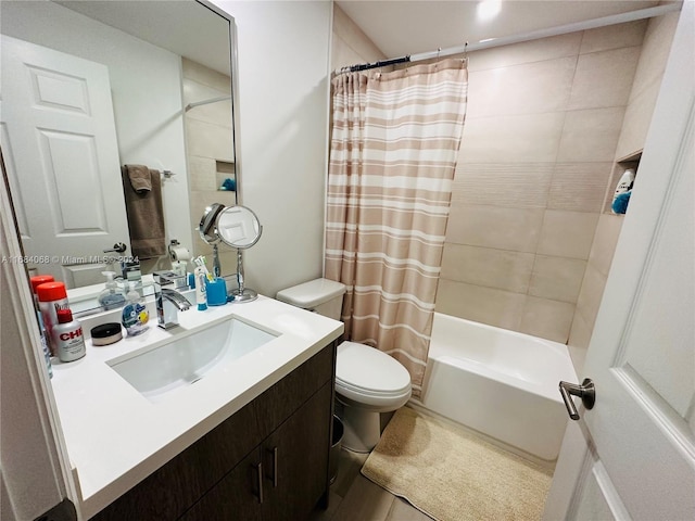 full bathroom featuring shower / tub combo with curtain, vanity, toilet, and tile patterned flooring