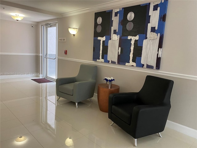 living area featuring tile patterned floors and ornamental molding