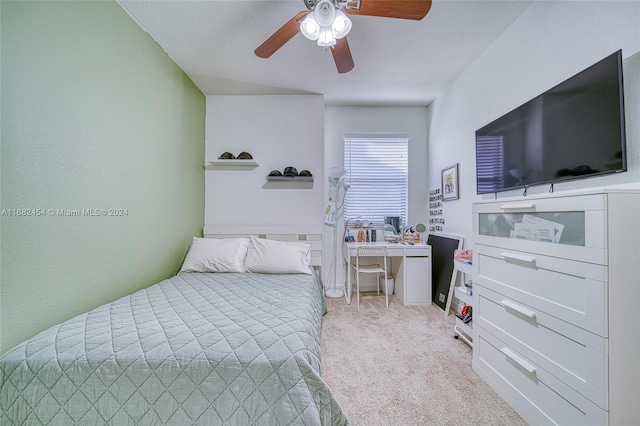 bedroom featuring ceiling fan and light colored carpet