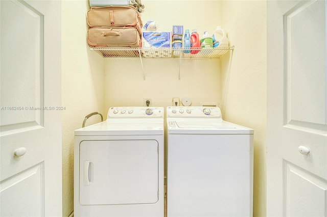 clothes washing area with independent washer and dryer