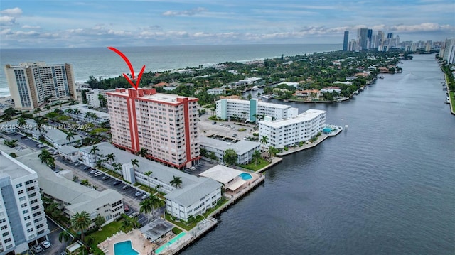 birds eye view of property featuring a water view