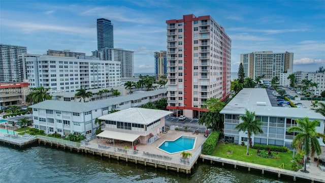 property's view of city featuring a water view