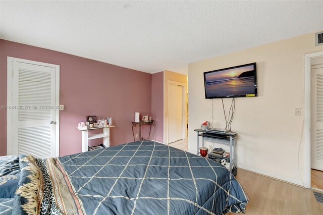 3161 S Ocean Dr Unit 203, Hallandale Beach, FL 33009 - bedroom with wood finished floors and baseboards