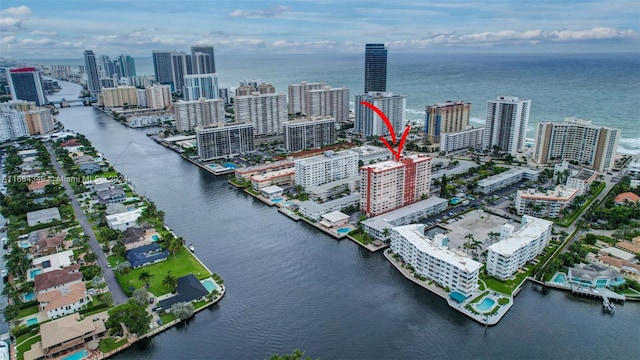 birds eye view of property featuring a water view