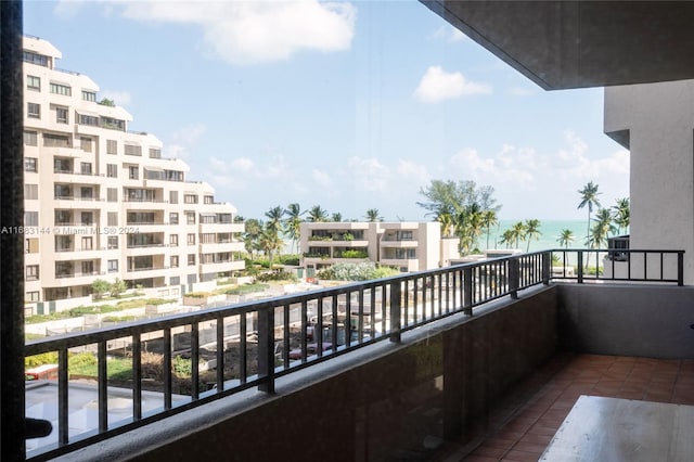 balcony featuring a water view