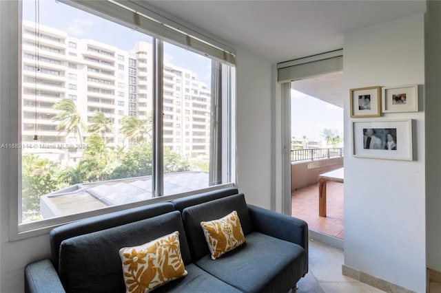 living area featuring light tile patterned floors