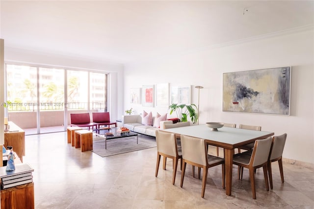 dining area with ornamental molding