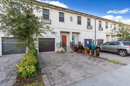 view of property with a garage