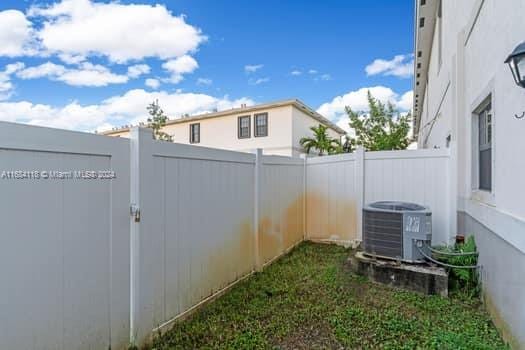 view of yard with cooling unit